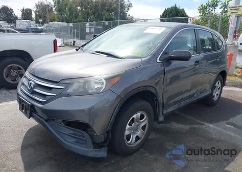 2014 Honda Cr-V Lx z USA, uszkodzony, nr VIN 2HKRM4H38EH615679